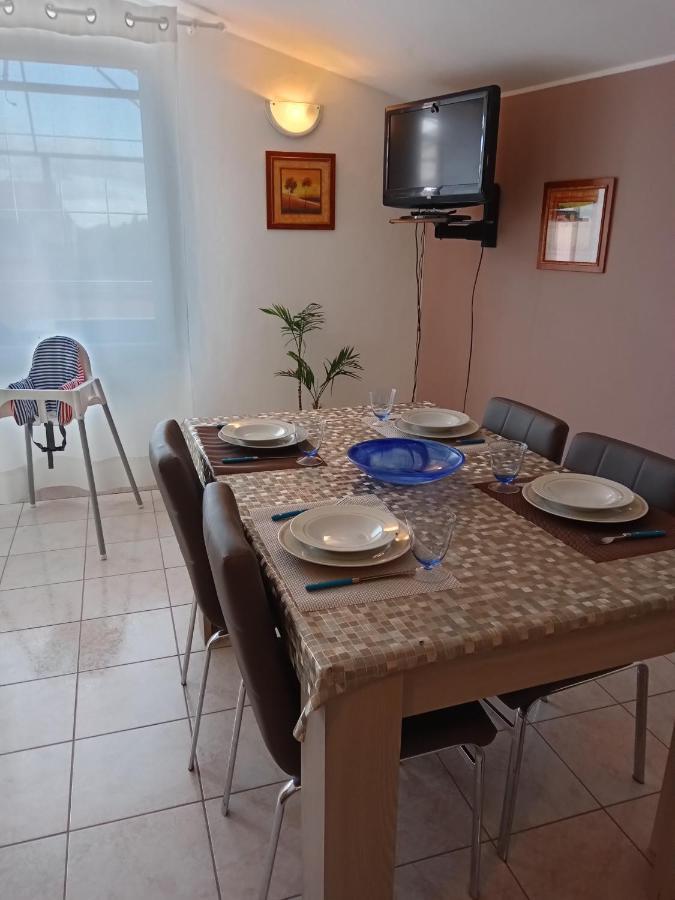 Casa Vacanza Le 2 Isole Suni Экстерьер фото